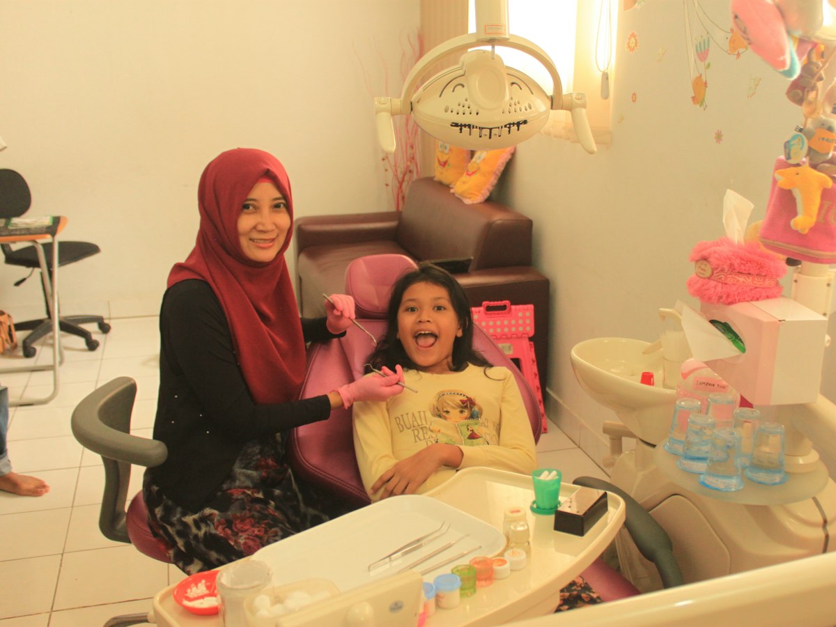 Smiling parent and child at Vector Dental Studio
